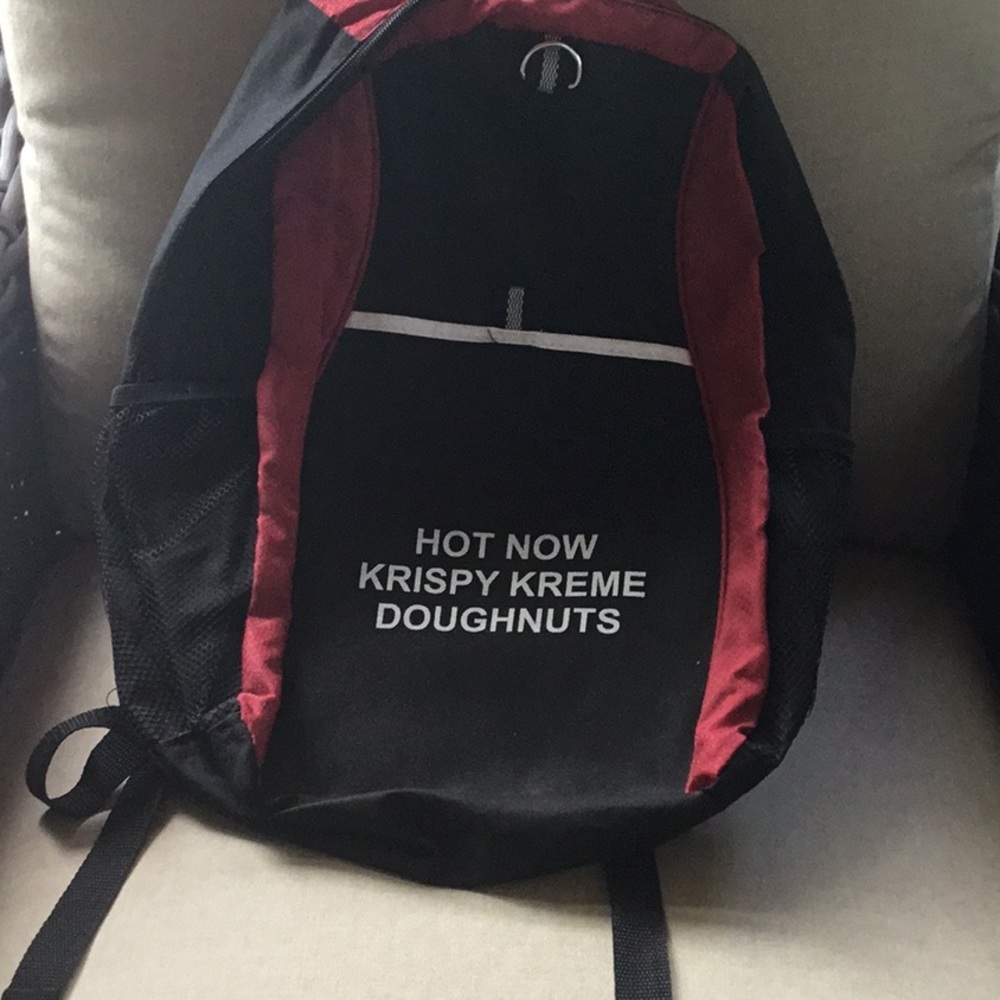NWOT Krispy Kreme “hot doughnuts” backpack.